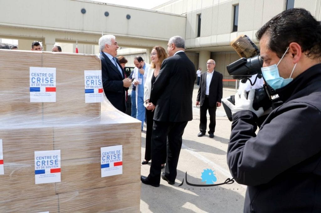 Lebanese officials receiving medical equipment sent by France