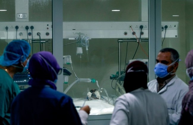 A medical team gathers in an Intensive Care Unit at Rafik Hariri University Hospital.