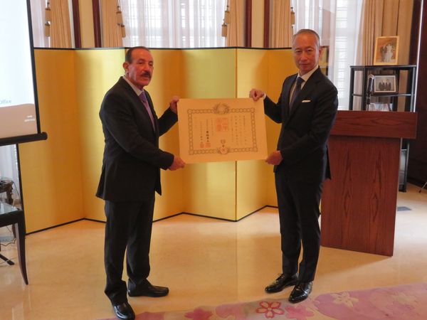 Francois Saade receives the Order of the Rising Sun from Japan's ambassador to Lebanon.