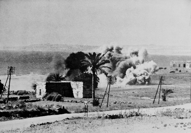 Shell-fire during the Australian advance along the coast road south of Beirut in July 1941.
