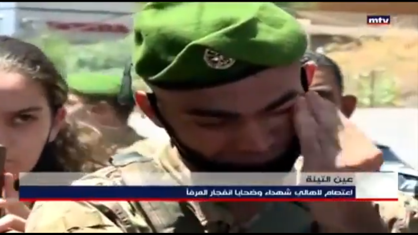 A soldier was filmed wiping his tears as he listened to a speech by one of the family members at the protest.
