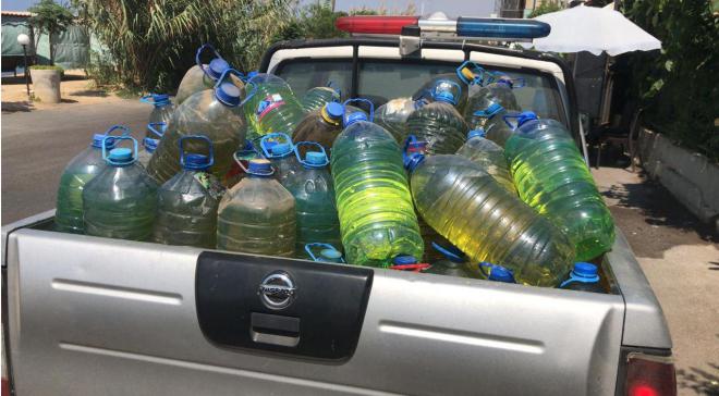 Security forces confiscated dozens of gallons of fuel, prepared for sale on the black market, in a coffee shop in Mount Lebanon.